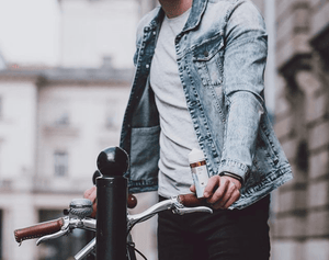 man walking with bike 